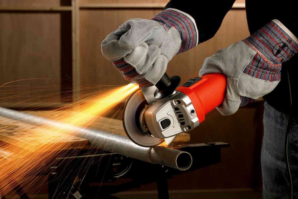 Angle grinder with a cut off wheel to cut rebar